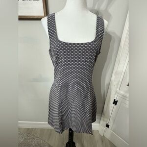 hanna rayon scallop babydoll mini dress NWT UO Hanna Rayon Tiered Scallop Babydoll Mini Dress Urban Outfitter Leopard XS